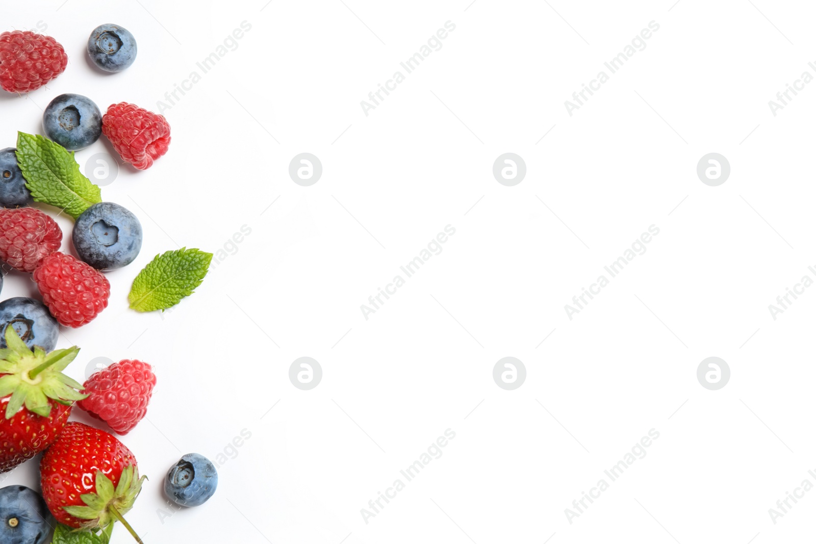 Photo of Mix of fresh berries on white background, flat lay