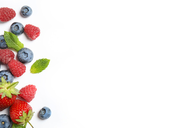 Photo of Mix of fresh berries on white background, flat lay