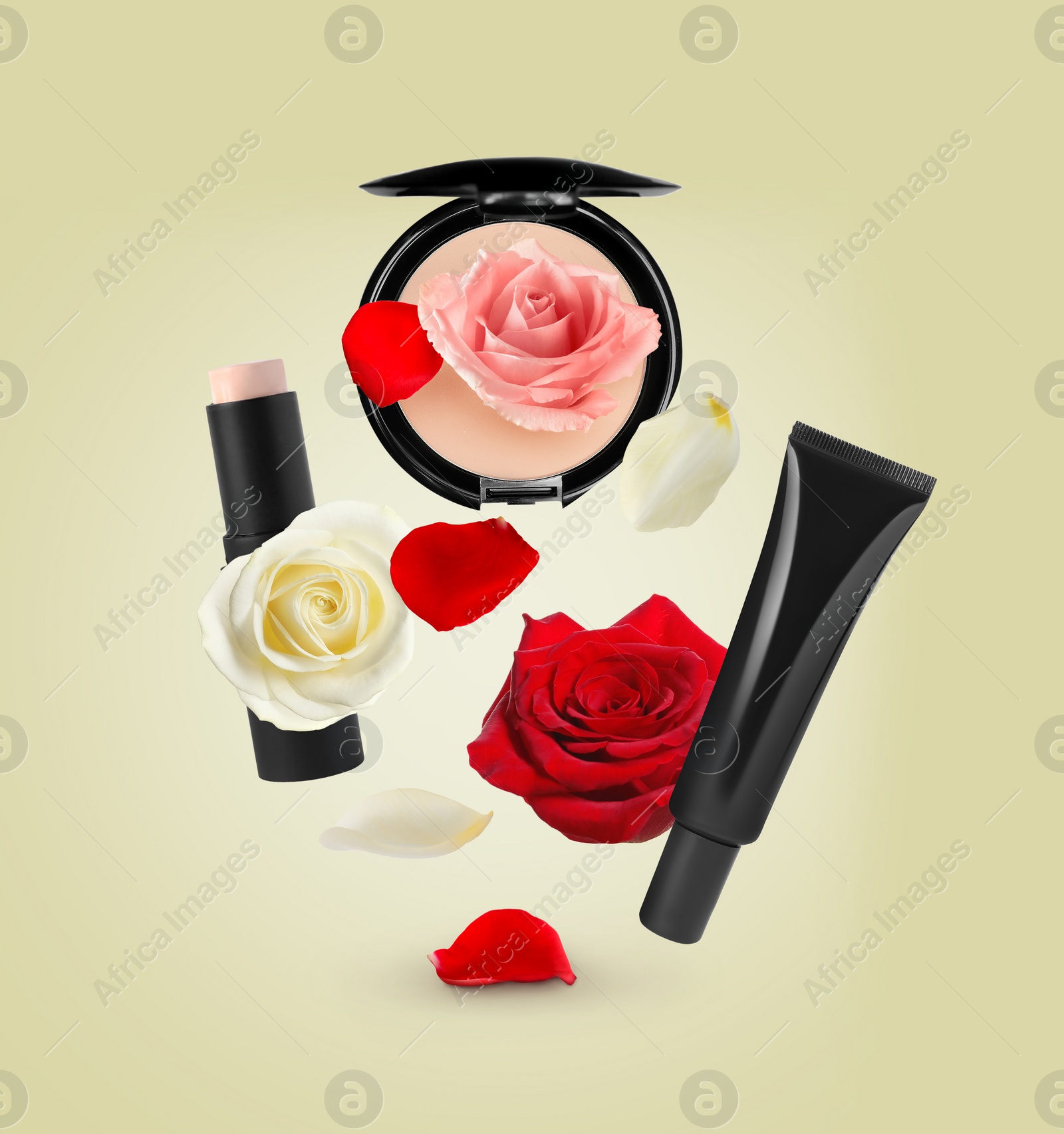 Image of Different makeup products and beautiful roses in air on light yellow background