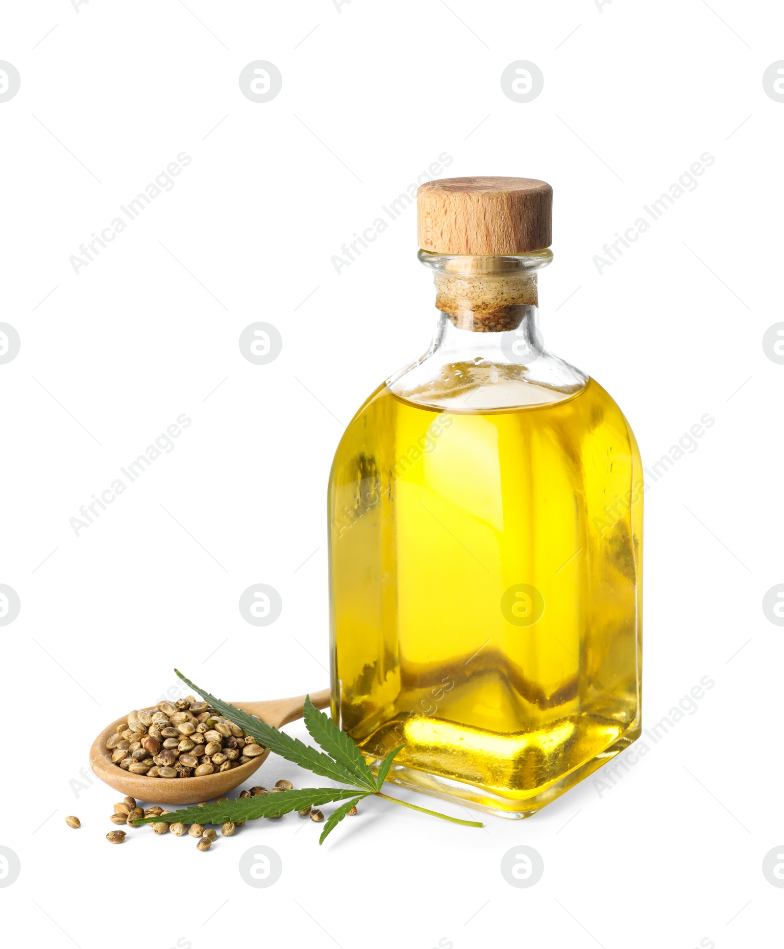 Photo of Bottle with hemp oil, leaf and seeds on white background