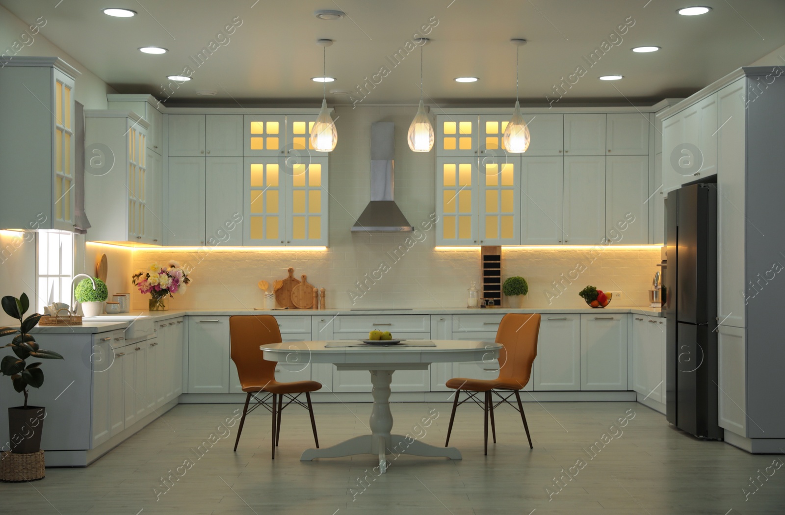 Photo of Stylish kitchen interior with modern furniture. Idea for design