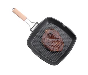 Grill pan with delicious fried beef meat isolated on white, top view