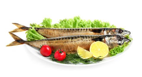 Photo of Plate with tasty smoked fish isolated on white