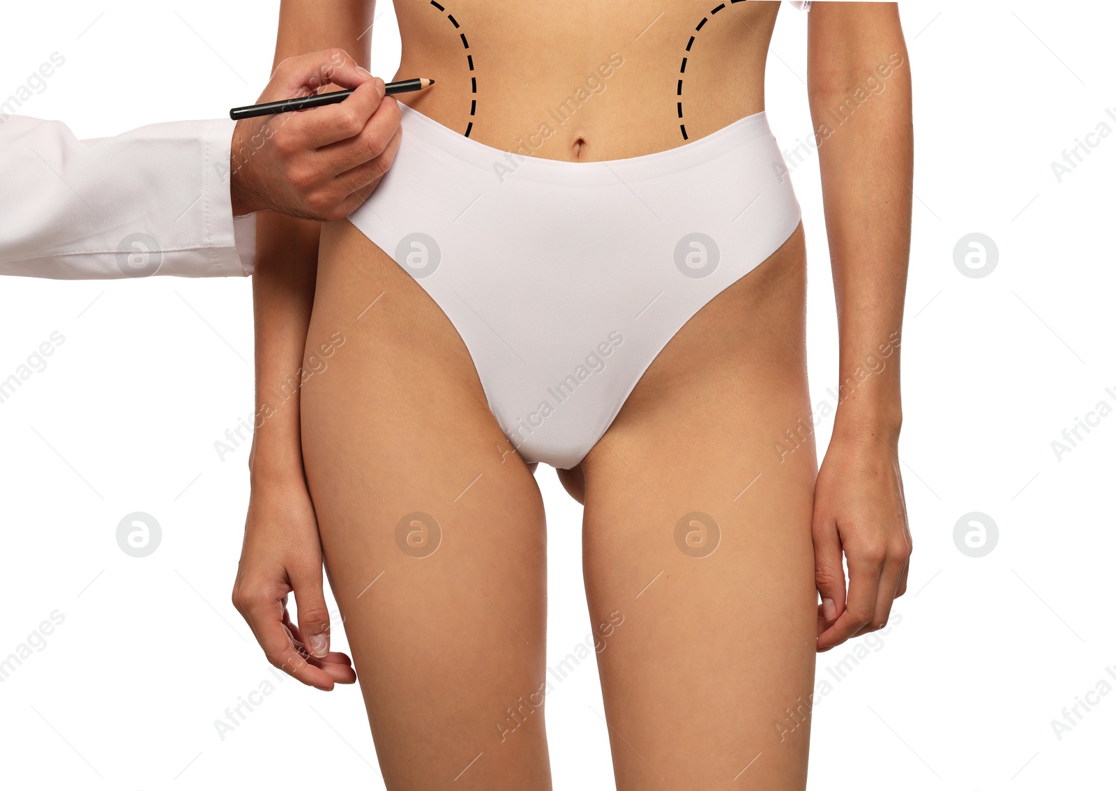 Image of Woman preparing for cosmetic surgery, white background. Doctor drawing markings on her abdomen, closeup