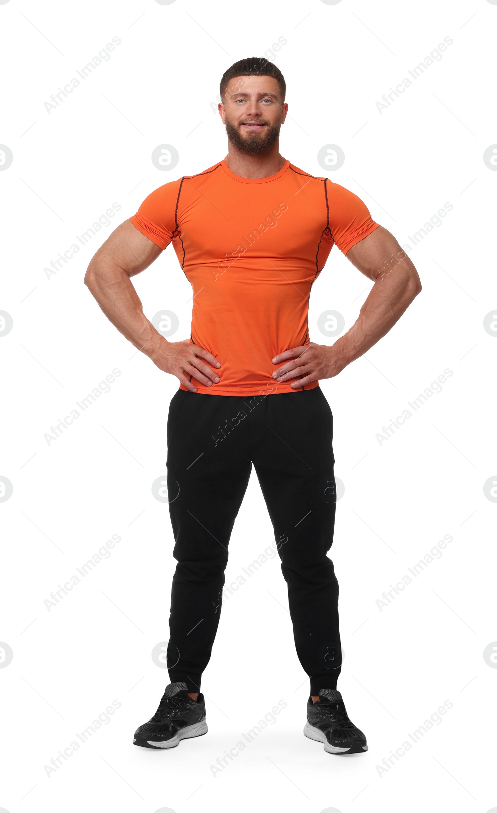 Photo of Young bodybuilder with muscular body on white background