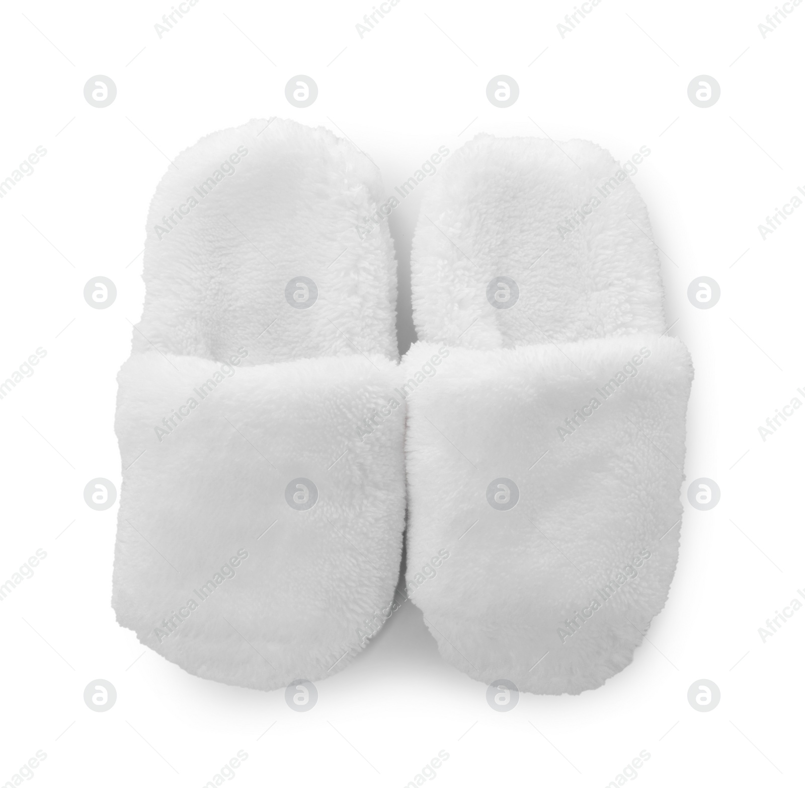 Photo of Pair of soft slippers isolated on white, top view