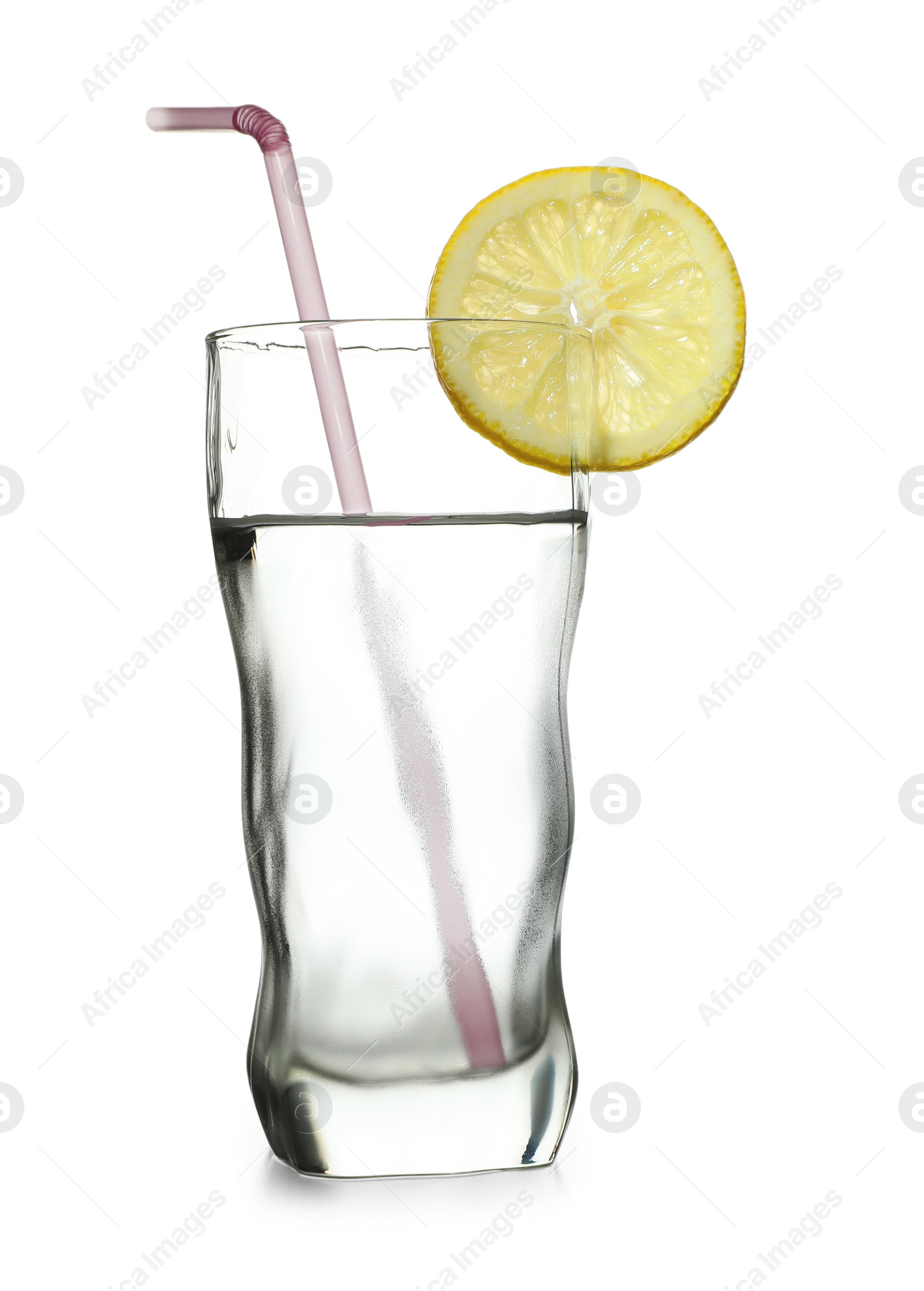 Photo of Glass of water with lemon and straw on white background. Refreshing drink