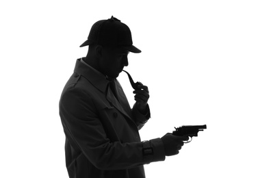 Photo of Old fashioned detective with smoking pipe and revolver on white background