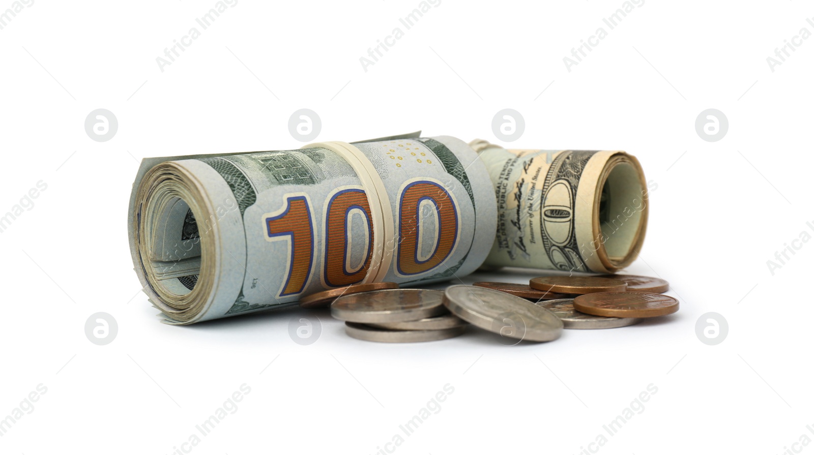 Photo of Rolled dollar banknotes and coins on white background