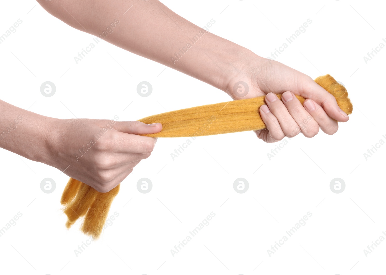 Photo of Woman holding orange felting wool on white background, closeup