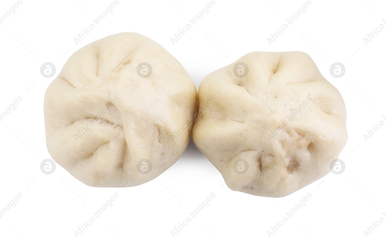 Photo of Delicious bao buns (baozi) isolated on white, top view