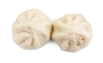 Photo of Delicious bao buns (baozi) isolated on white, top view