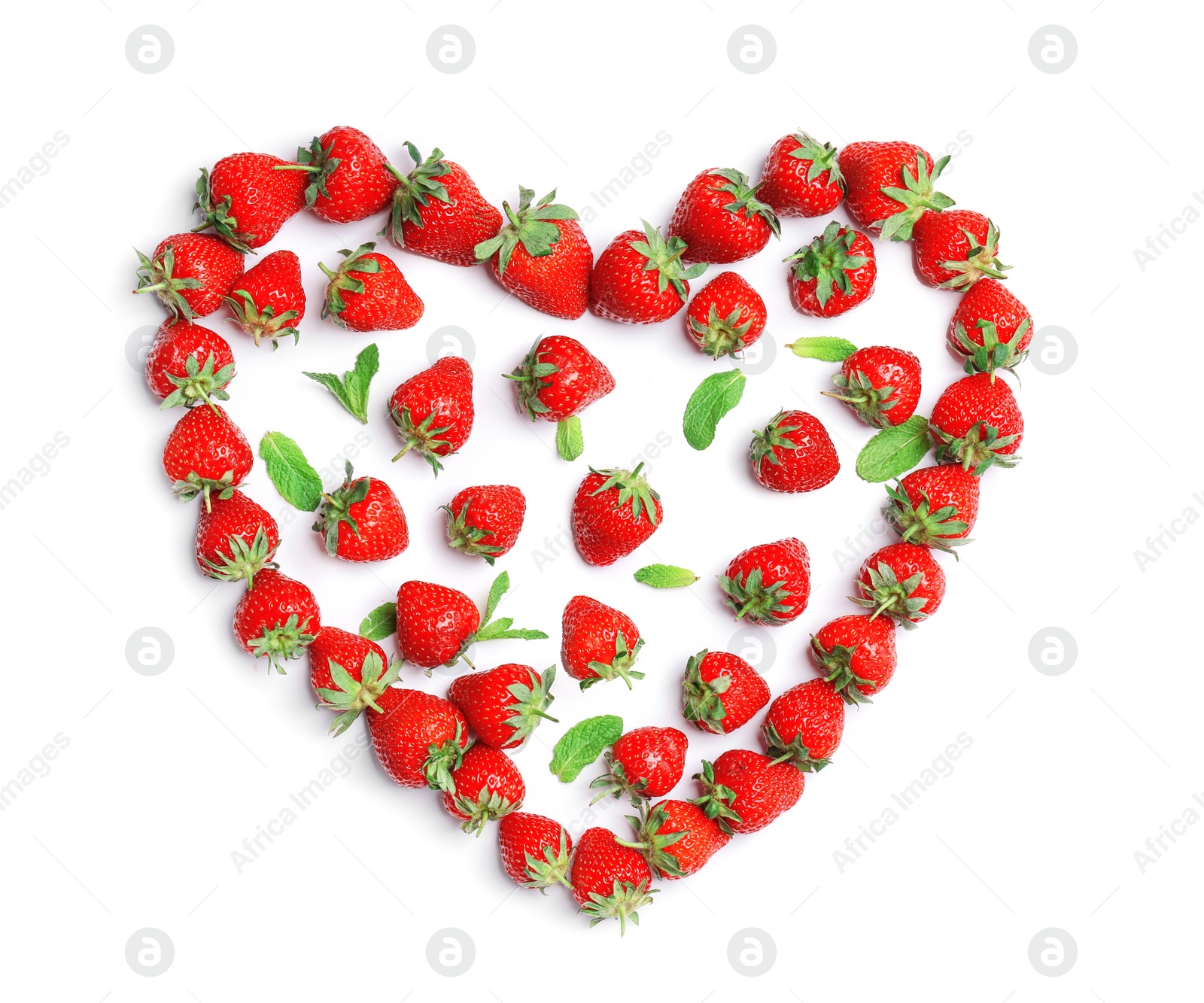 Photo of Heart shape made of ripe red strawberries on light background