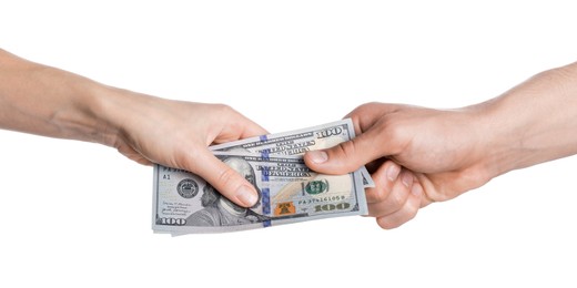 Photo of Money exchange. Man giving dollar banknotes to woman on white background, closeup