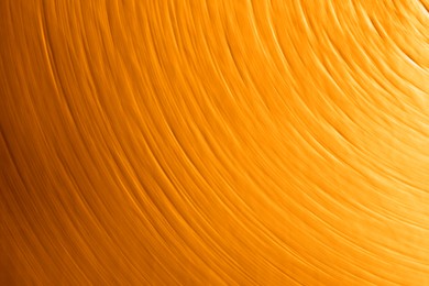 Image of Golden textured surface as background, closeup view