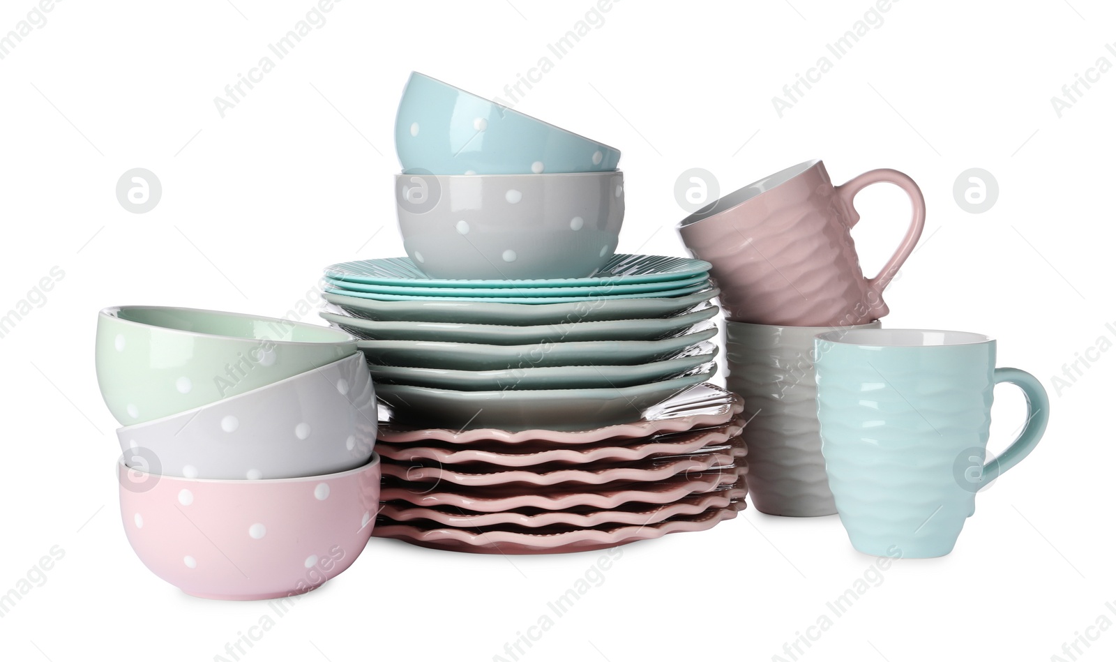 Photo of Set of beautiful ceramic dishware isolated on white