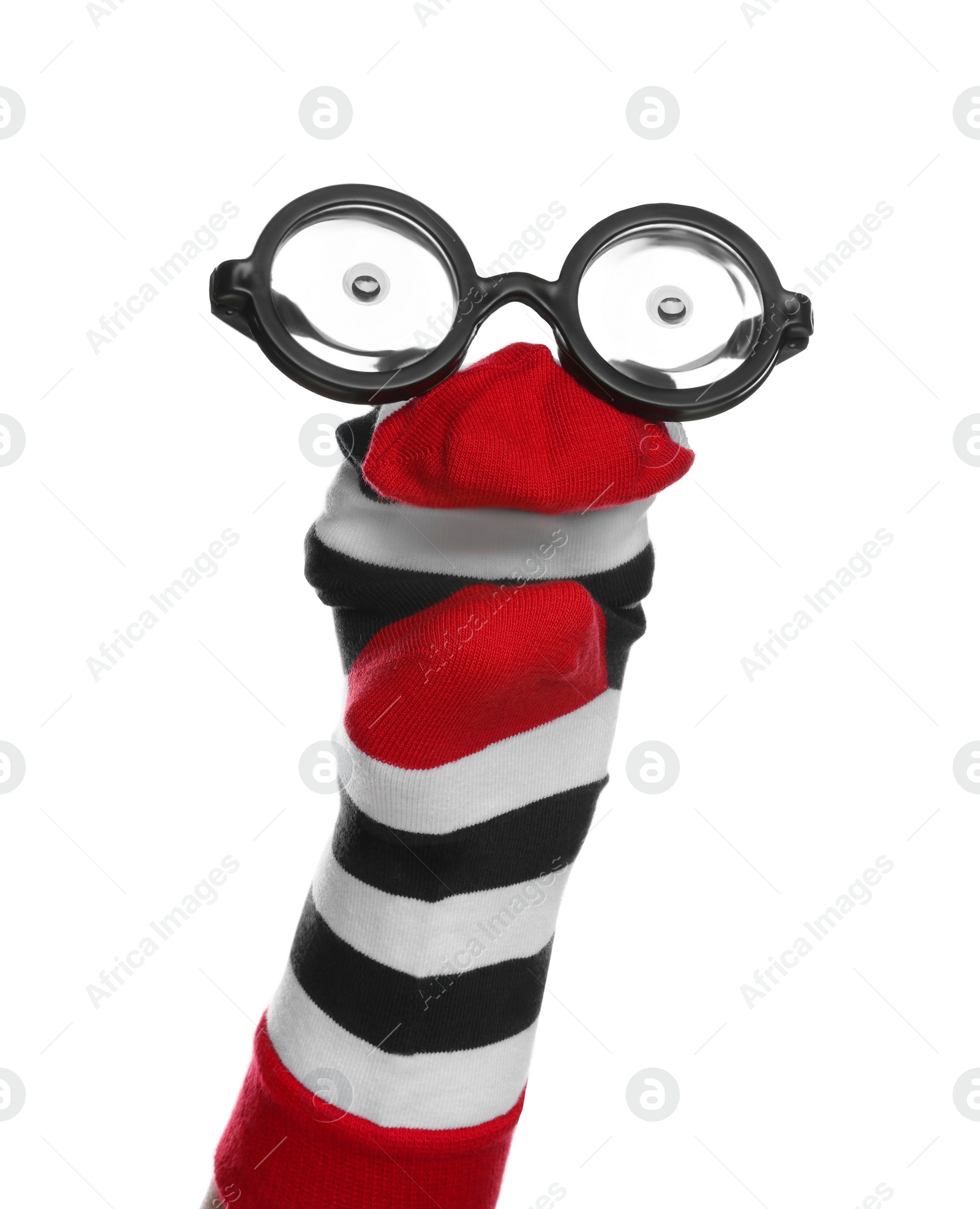 Photo of Funny sock puppet with glasses isolated on white