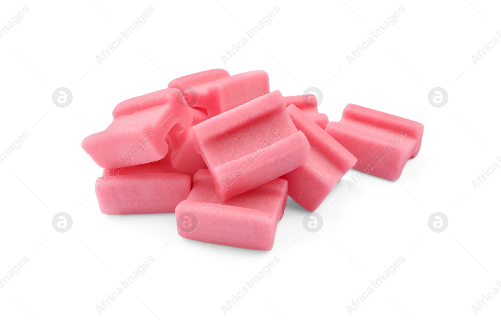 Photo of Pile of tasty pink chewing gums on white background