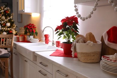 Beautiful kitchen interior with stylish Christmas decor