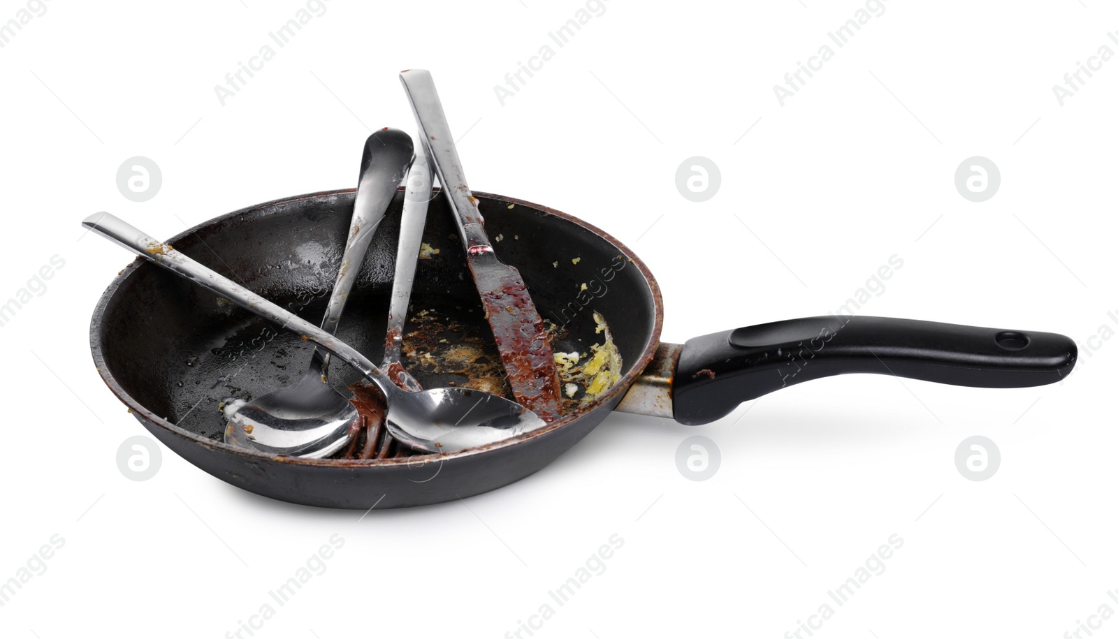 Photo of Dirty frying pan and cutlery on white background
