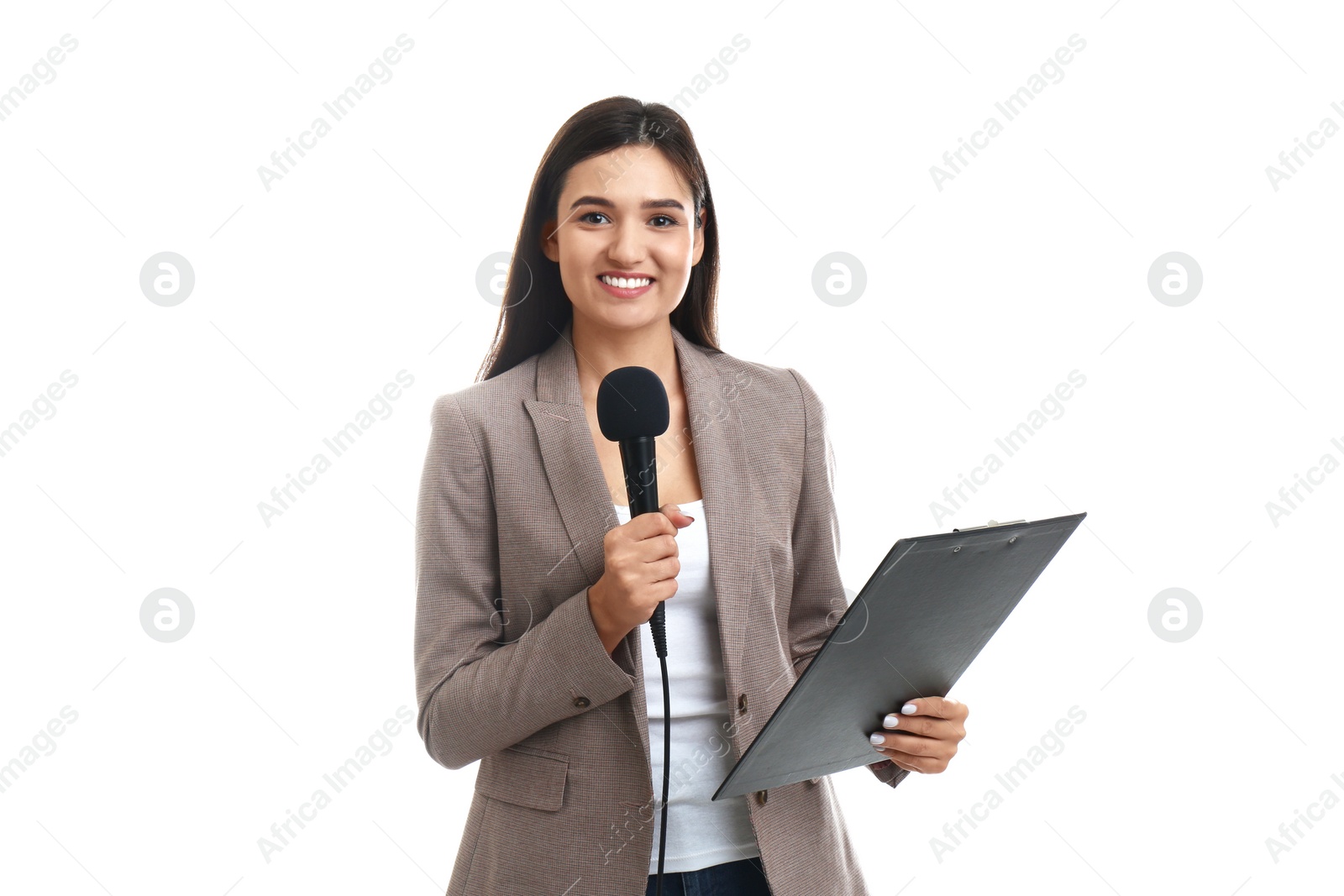 Photo of Young female journalist with microphone and clipboard on white background