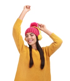 Photo of Young woman listening to music with headphones on white background