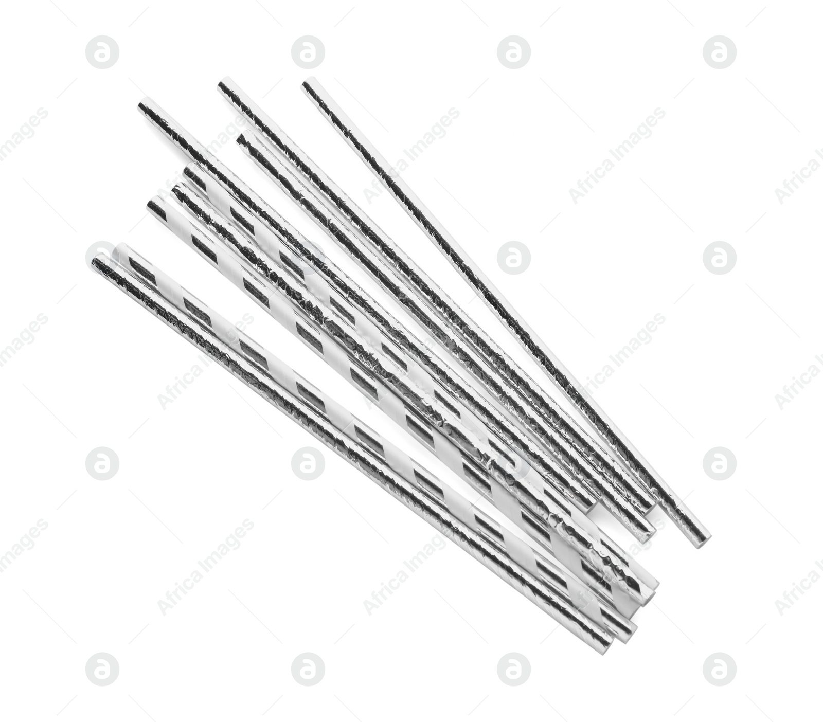 Photo of Different cocktail straws on white background, top view