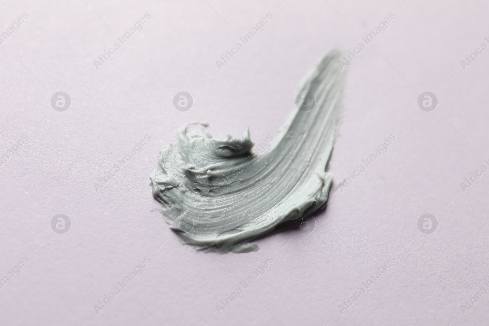 Photo of Sample of face mask on pink background, top view