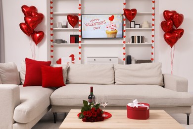 Photo of Cozy living room decorated for Valentine Day. Interior design