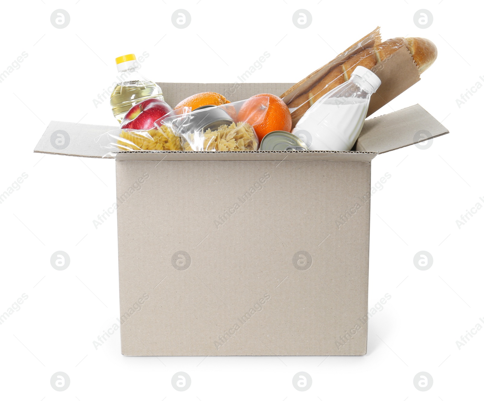 Photo of Cardboard box with donation food isolated on white