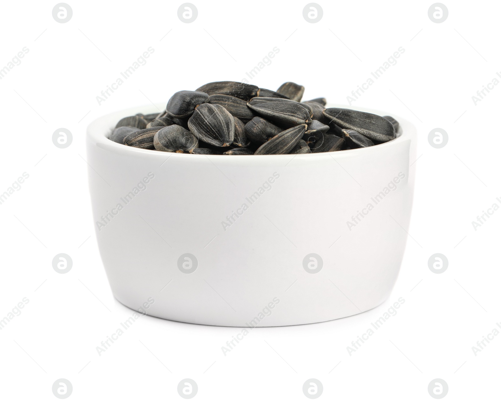 Photo of Sunflower seeds in bowl isolated on white