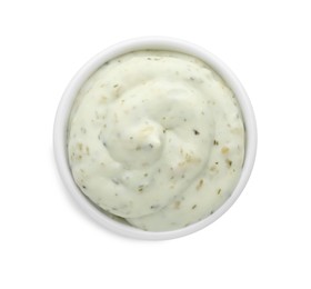 Photo of Tasty tartar sauce in bowl isolated on white, top view