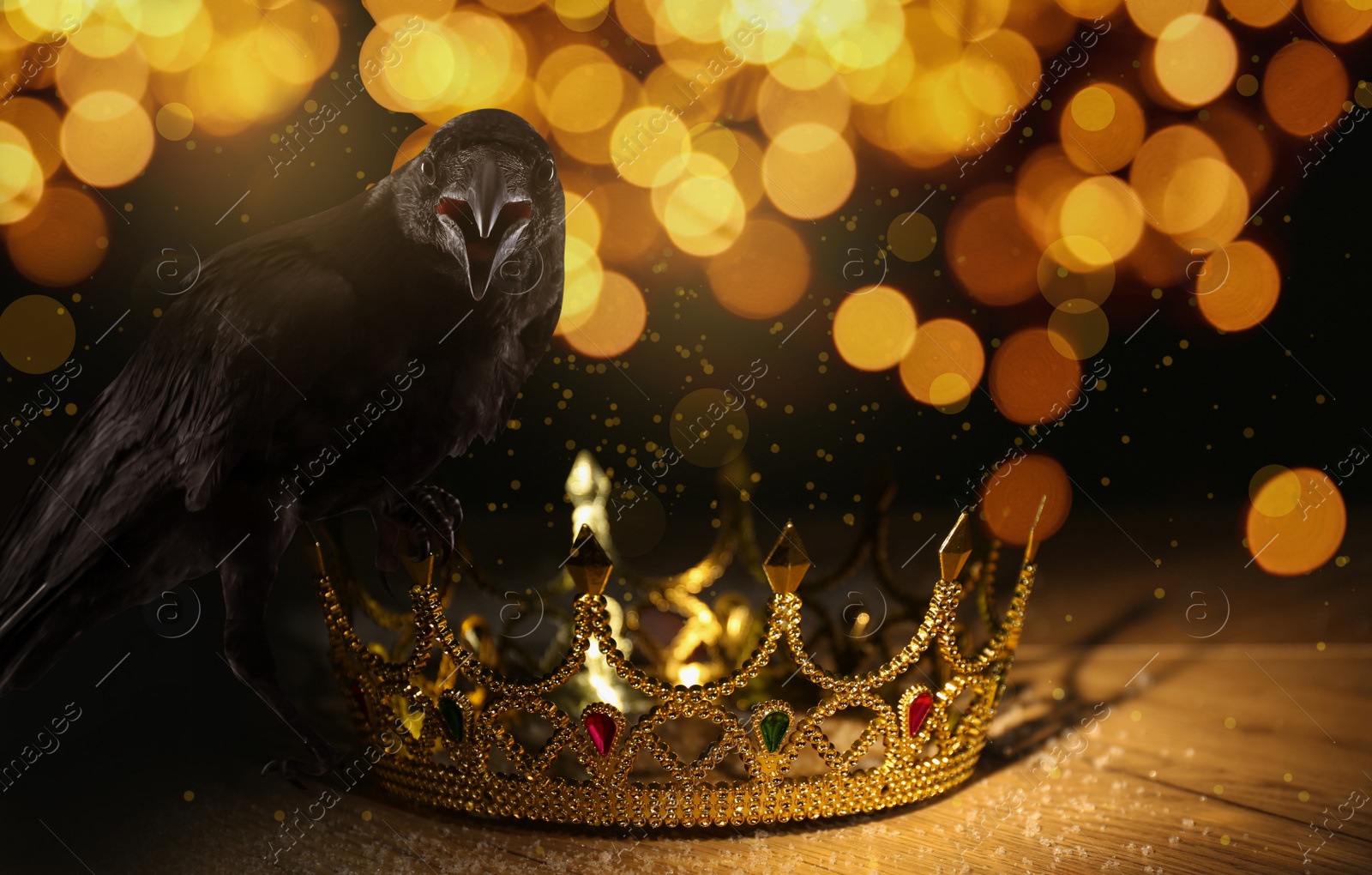 Image of Fantasy world. Black crow sitting on golden crown, bokeh effect