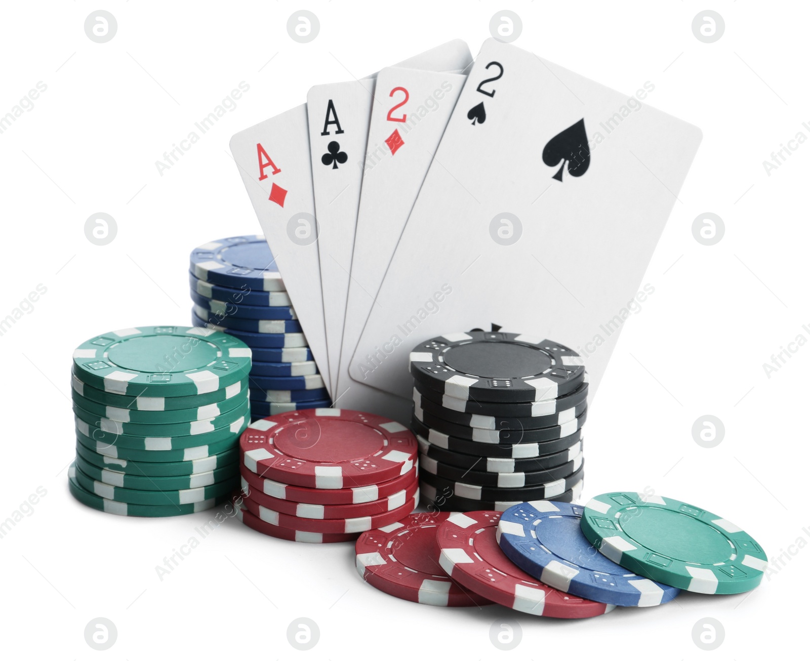 Photo of Playing cards and plastic casino chips on white background. Poker game