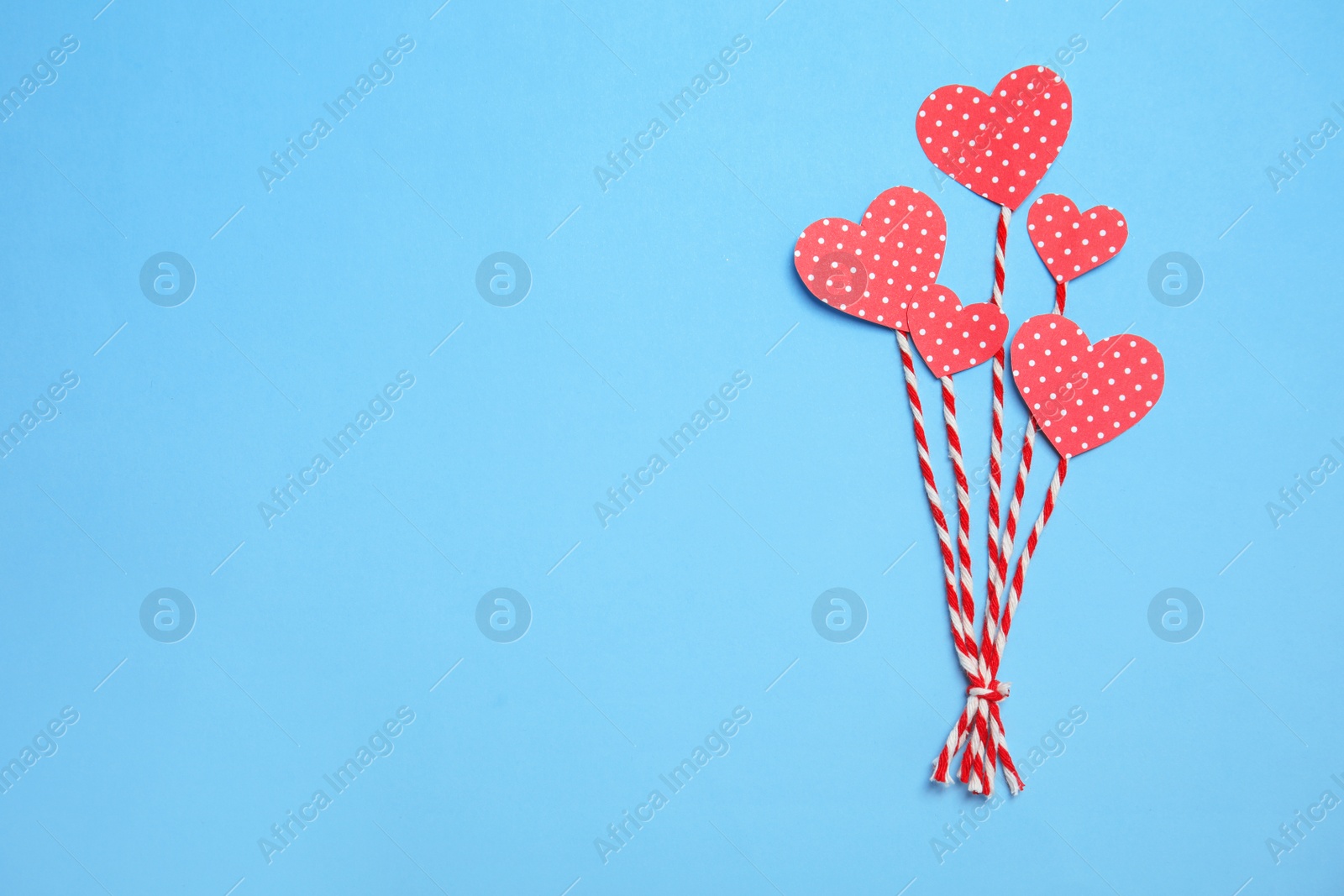 Photo of Composition with small paper hearts on color background