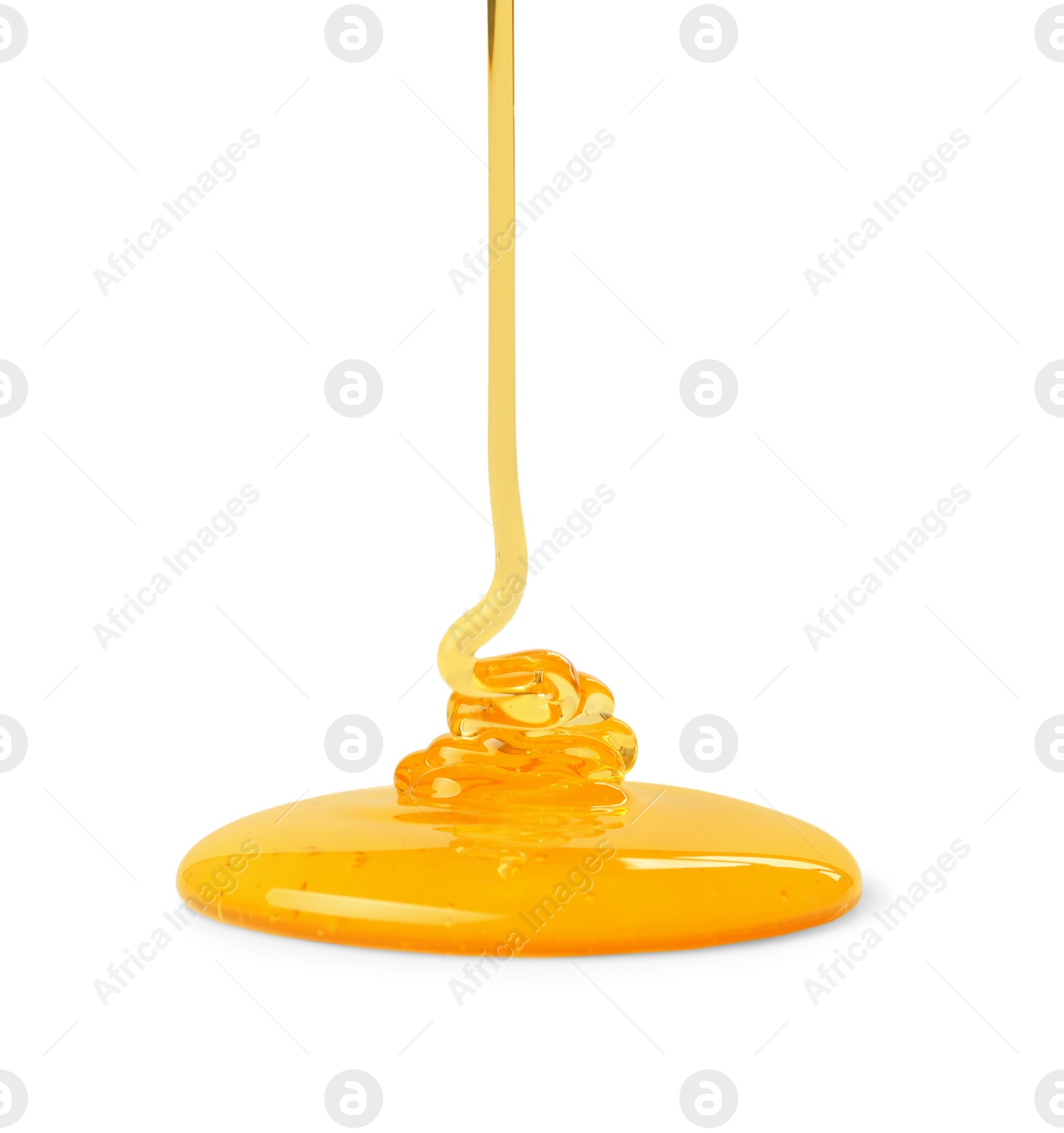 Photo of Pouring tasty natural honey isolated on white