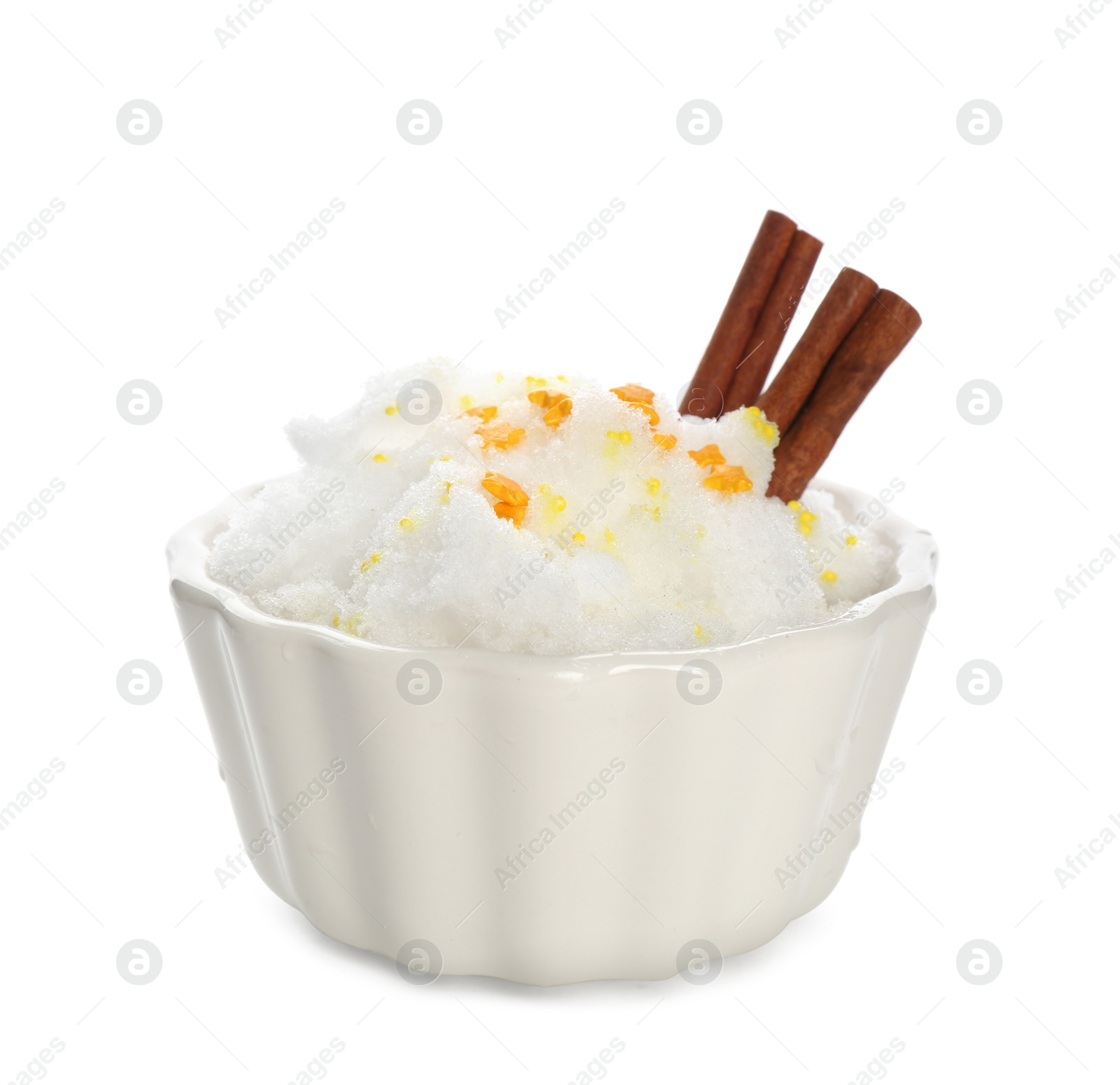 Photo of Snow ice cream with sprinkles and cinnamon in bowl on white background