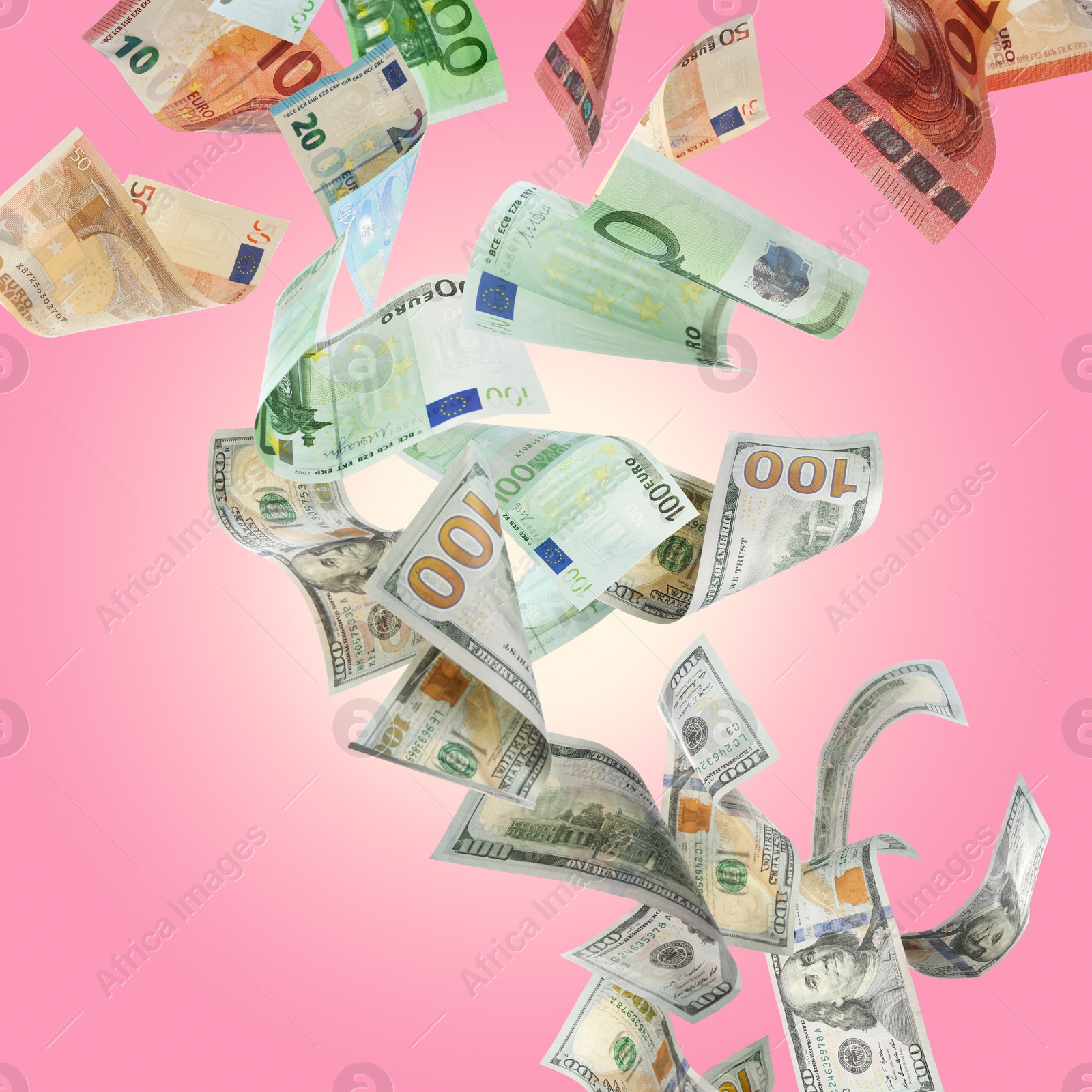 Image of Money exchange. Euro banknotes turning into dollars while falling on pink background