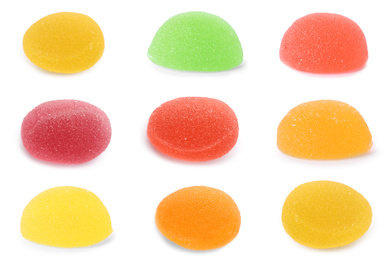 Set of delicious jelly candies on white background
