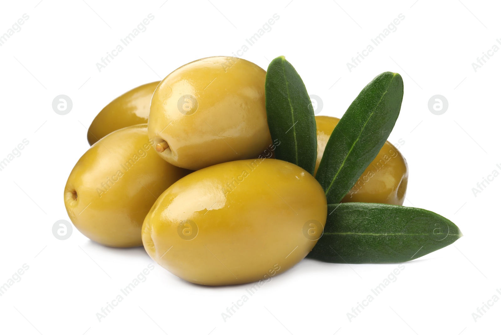 Photo of Olives with green leaves on white background