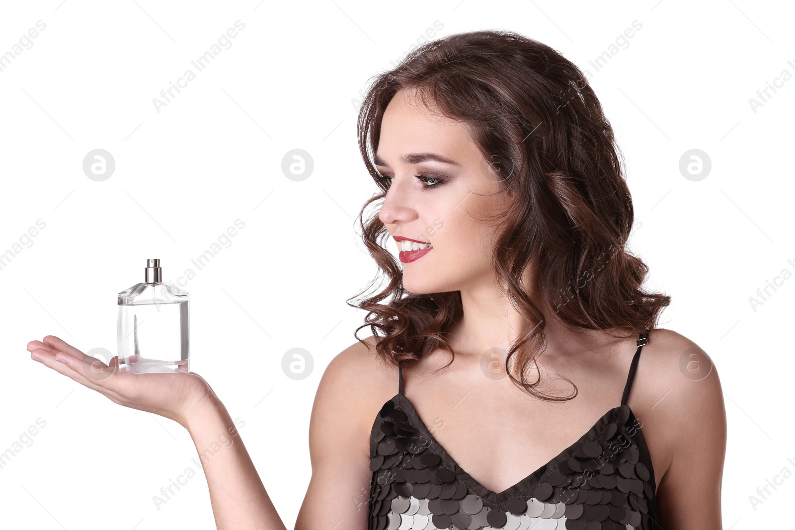 Photo of Beautiful young woman with bottle of perfume on white background