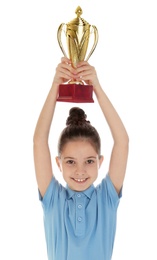Photo of Happy girl in school uniform with golden winning cup isolated on white