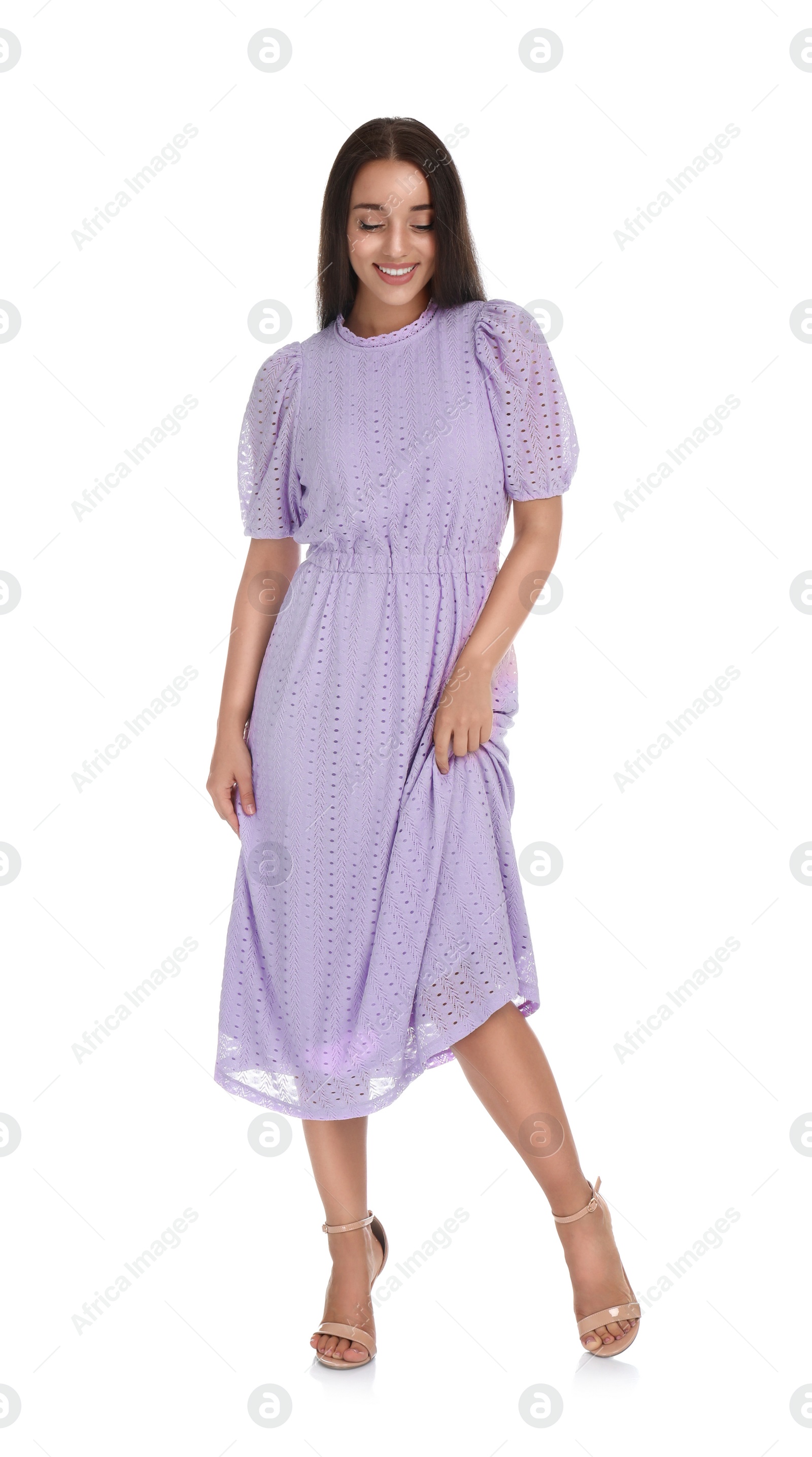 Photo of Young woman wearing stylish lilac dress on white background