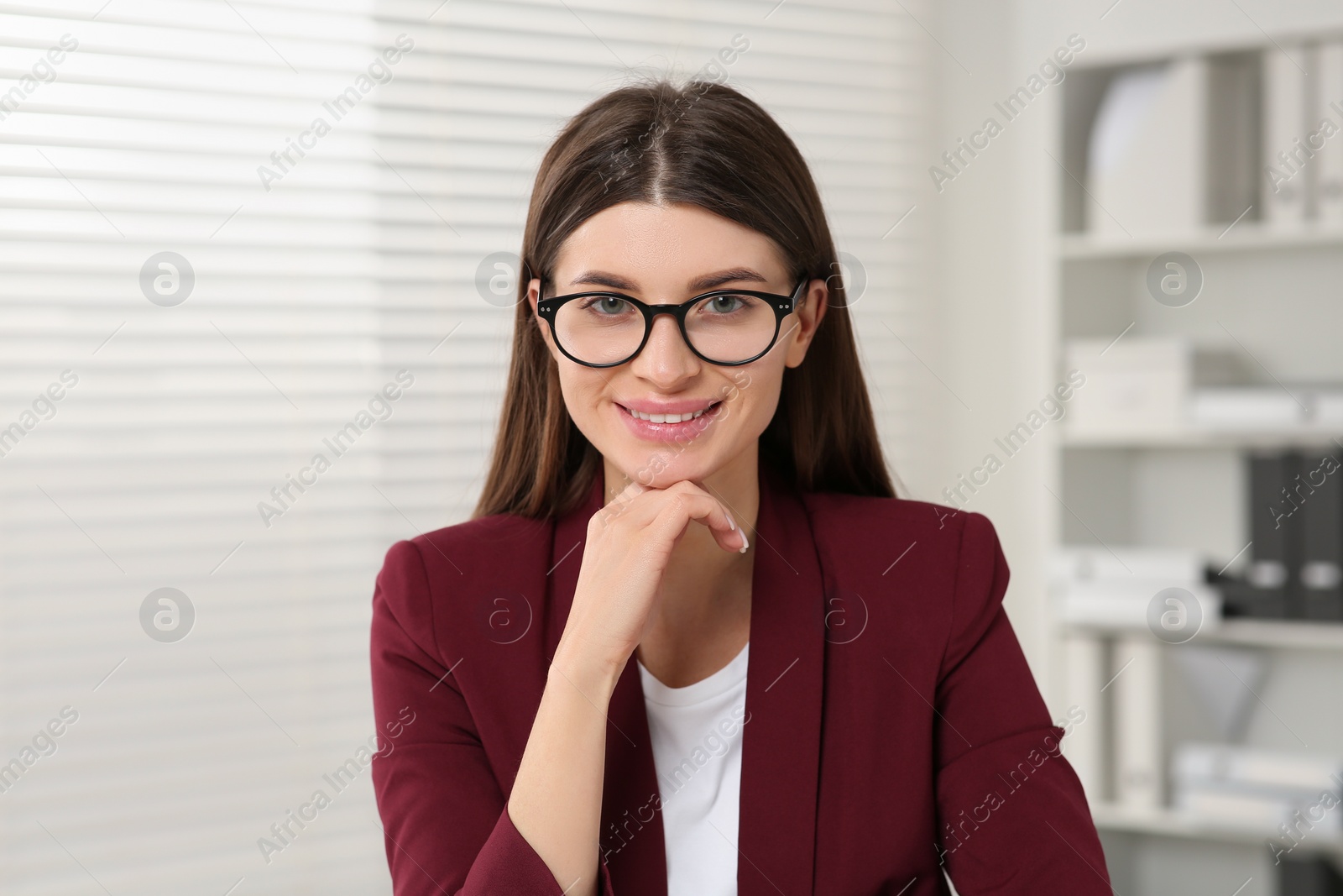 Photo of Happy woman in glasses having online video call at home, view from web camera