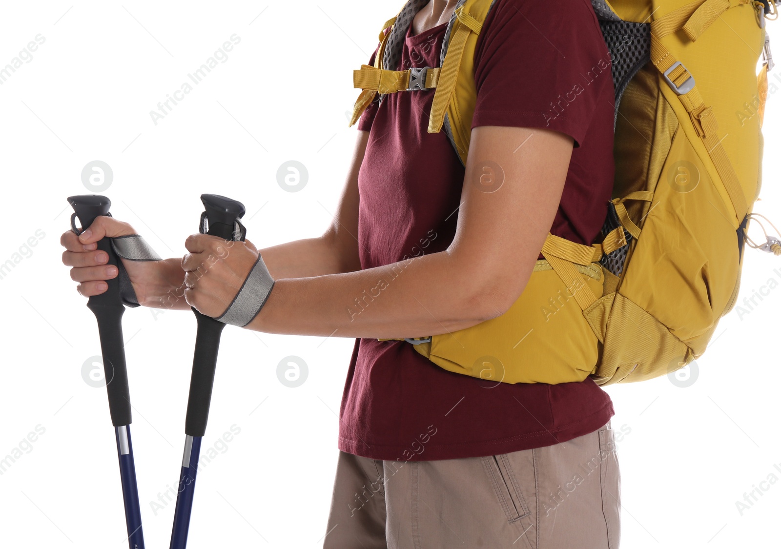 Photo of Female hiker with backpack and trekking poles on white background, closeup