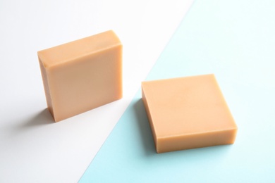 Photo of Hand made soap bars on color background