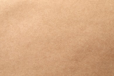 Texture of kraft paper sheet as background, closeup