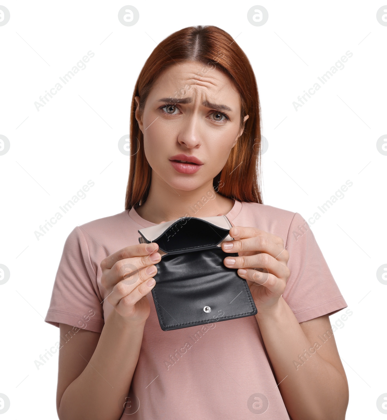 Photo of Confused woman with empty wallet on white background