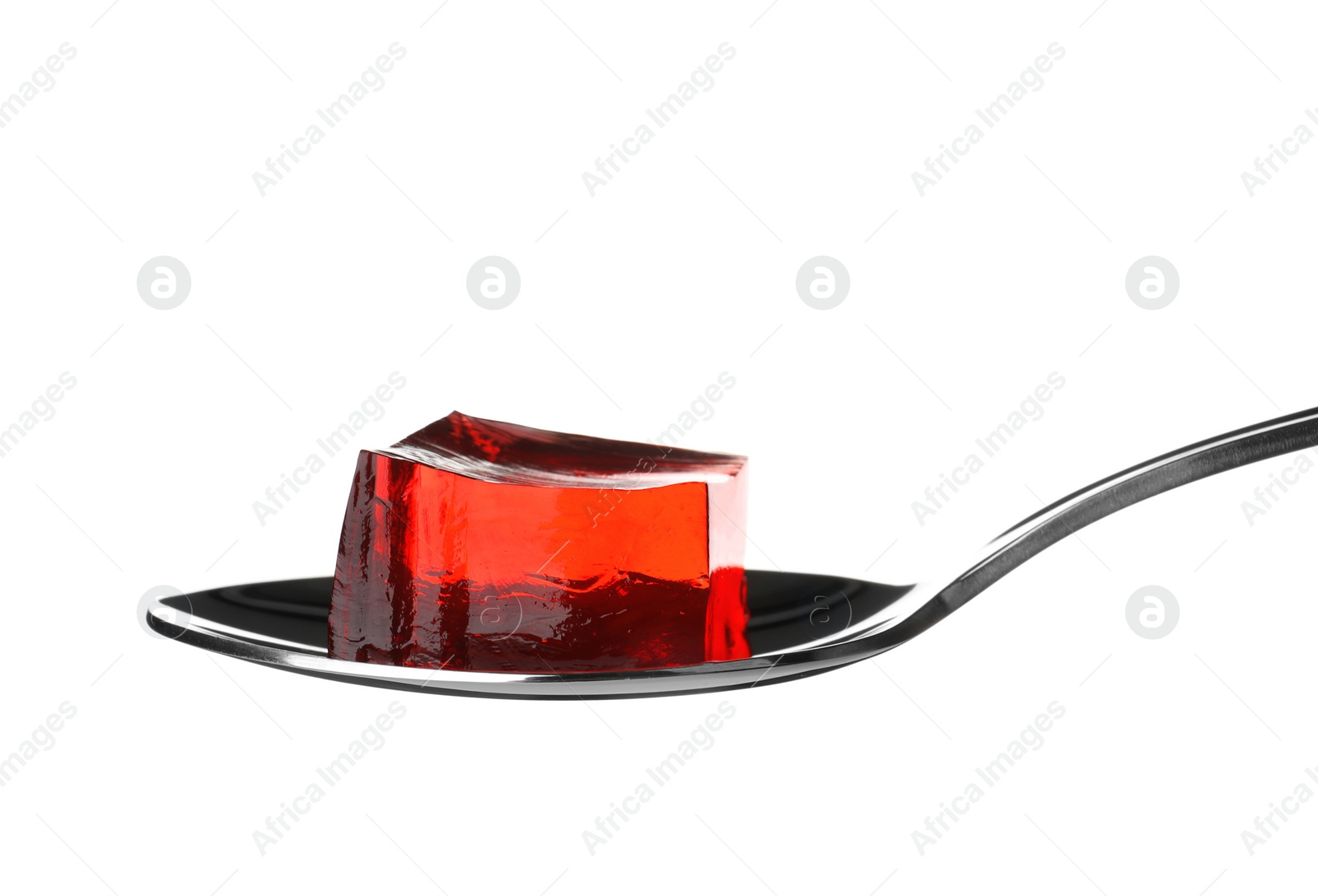 Photo of Spoon with tasty jelly cube isolated on white