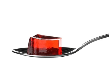 Photo of Spoon with tasty jelly cube isolated on white